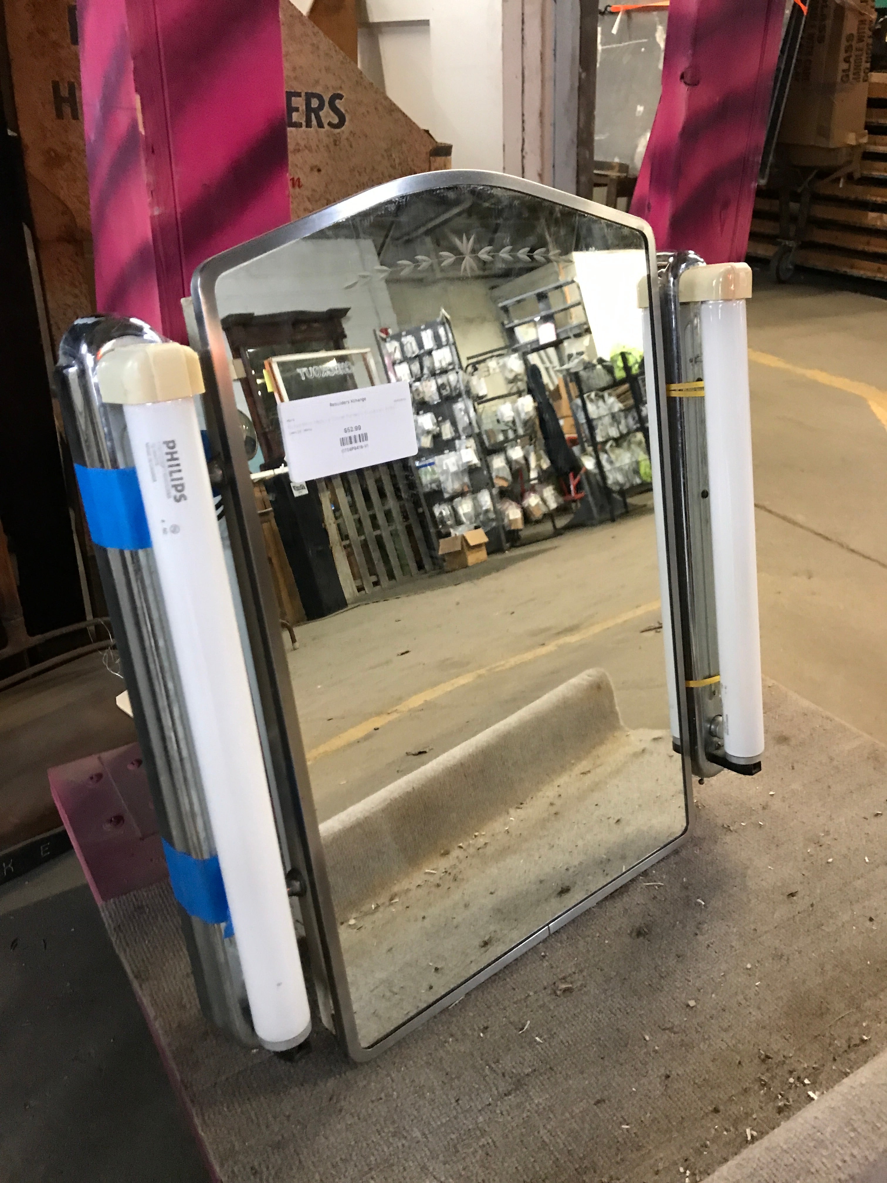 Etched Mirror Medicine Cabinet Flanked in Fluorescent Bulbs
