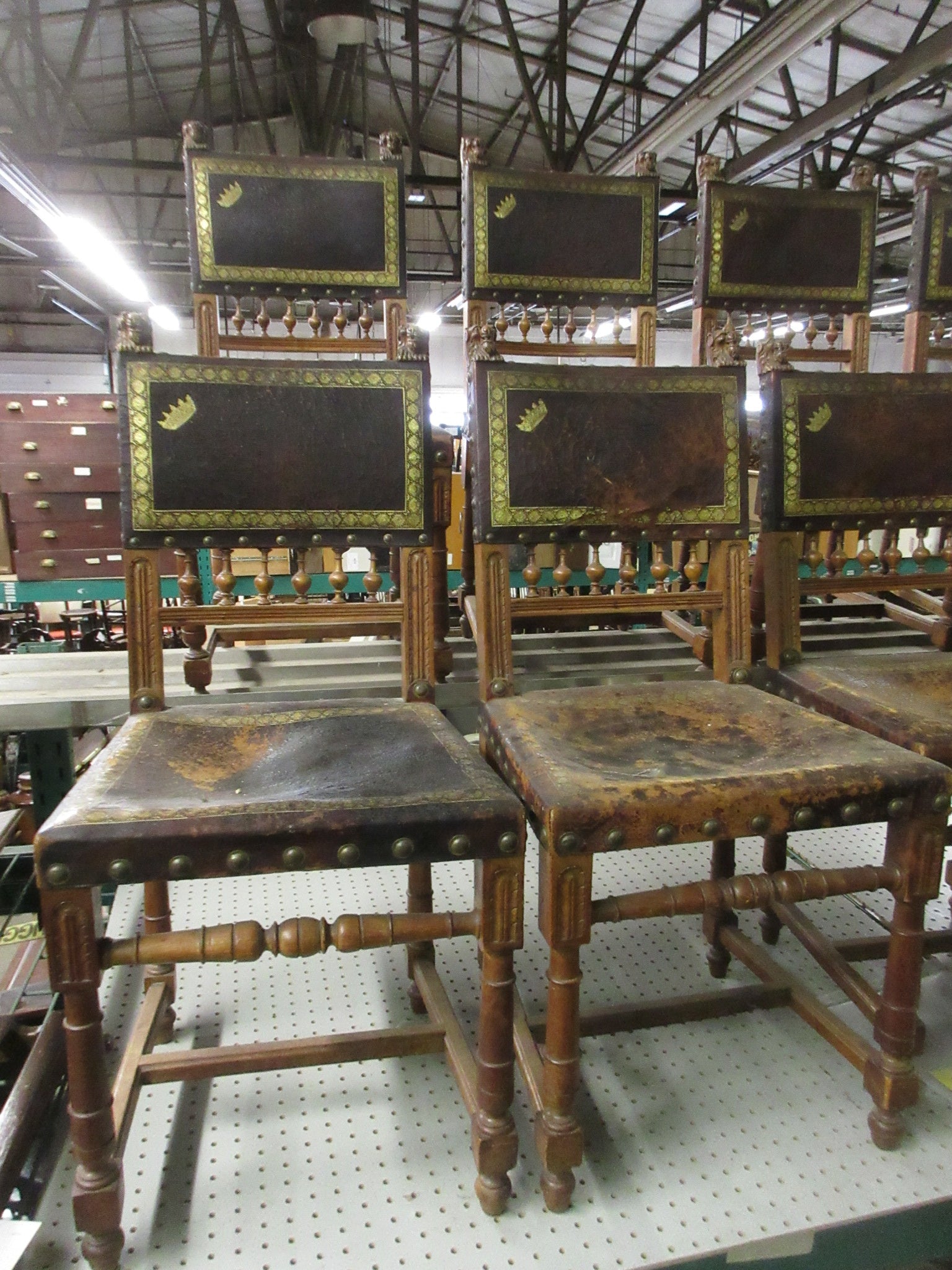 Set of 12 Antique Italian Leather Tooled Lion Head Chairs