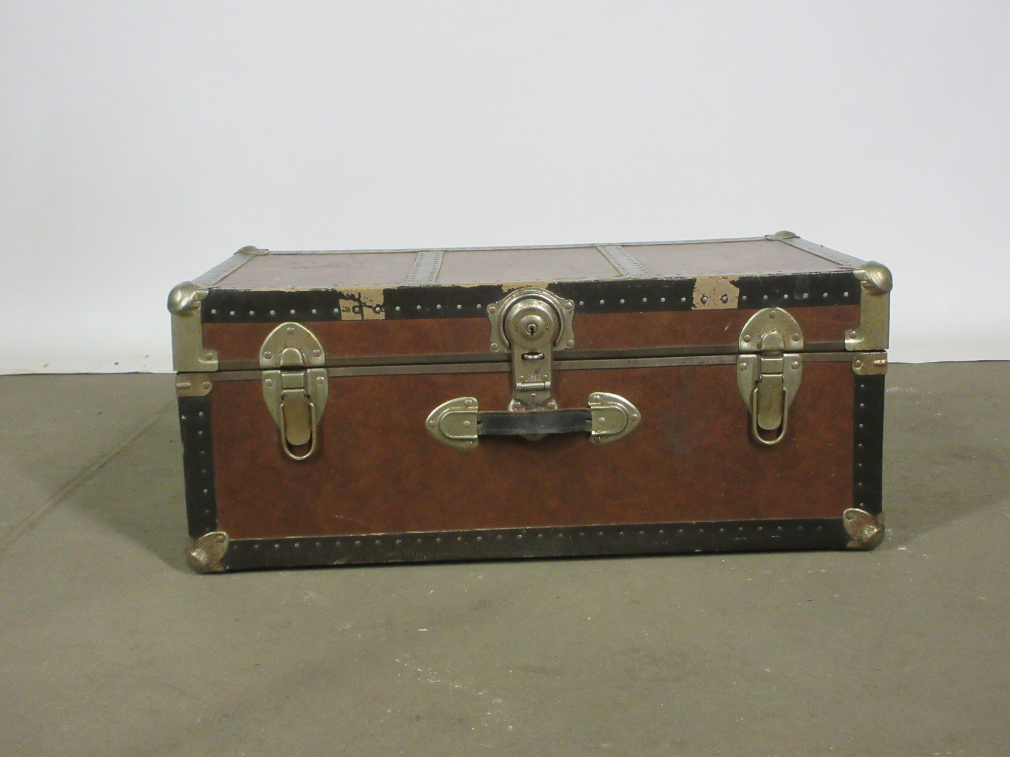 Brown Trunk with Leather Trim