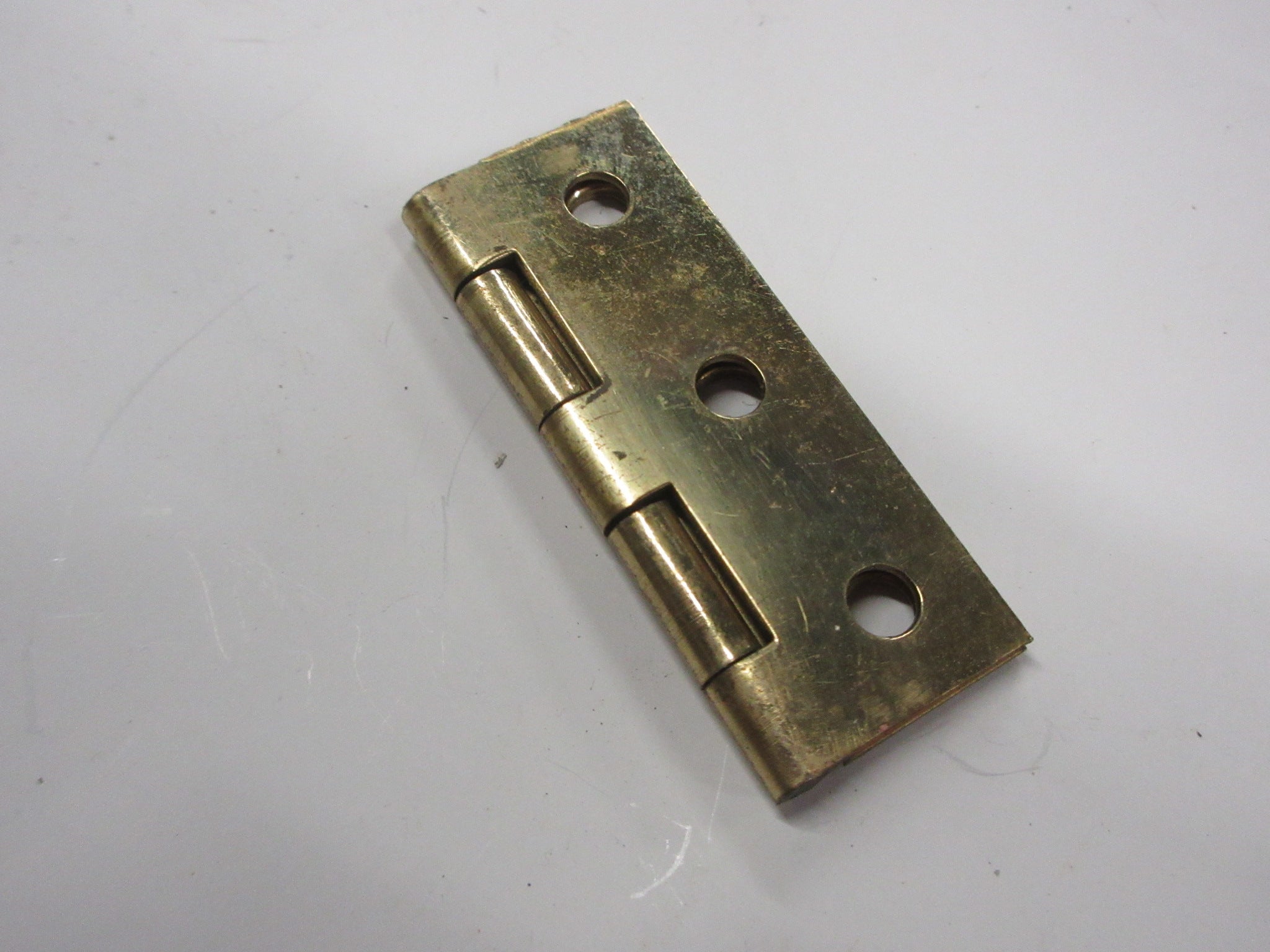 Small Brass Colored Hinge