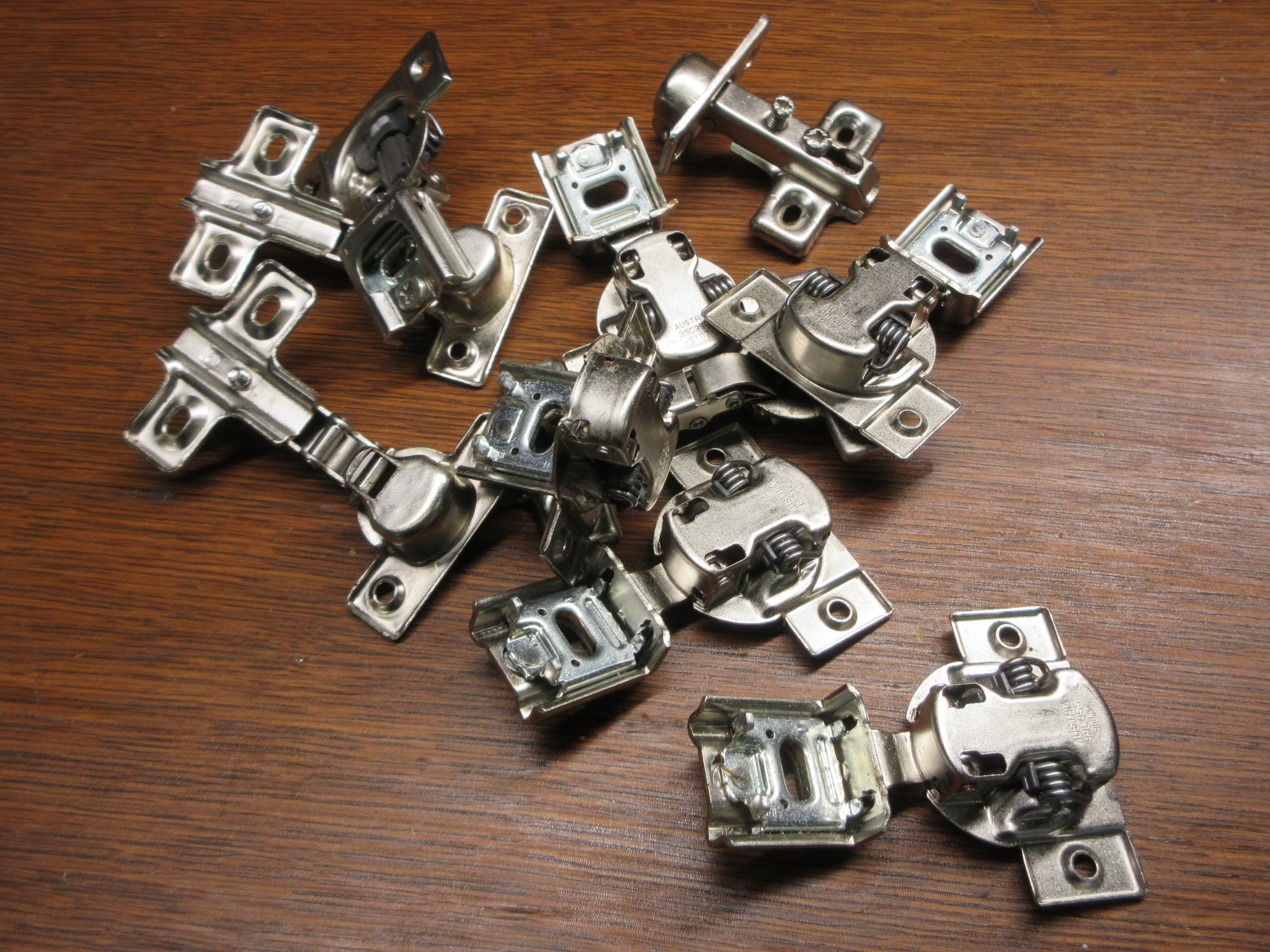 Lot of Ten Cabinet Hinges