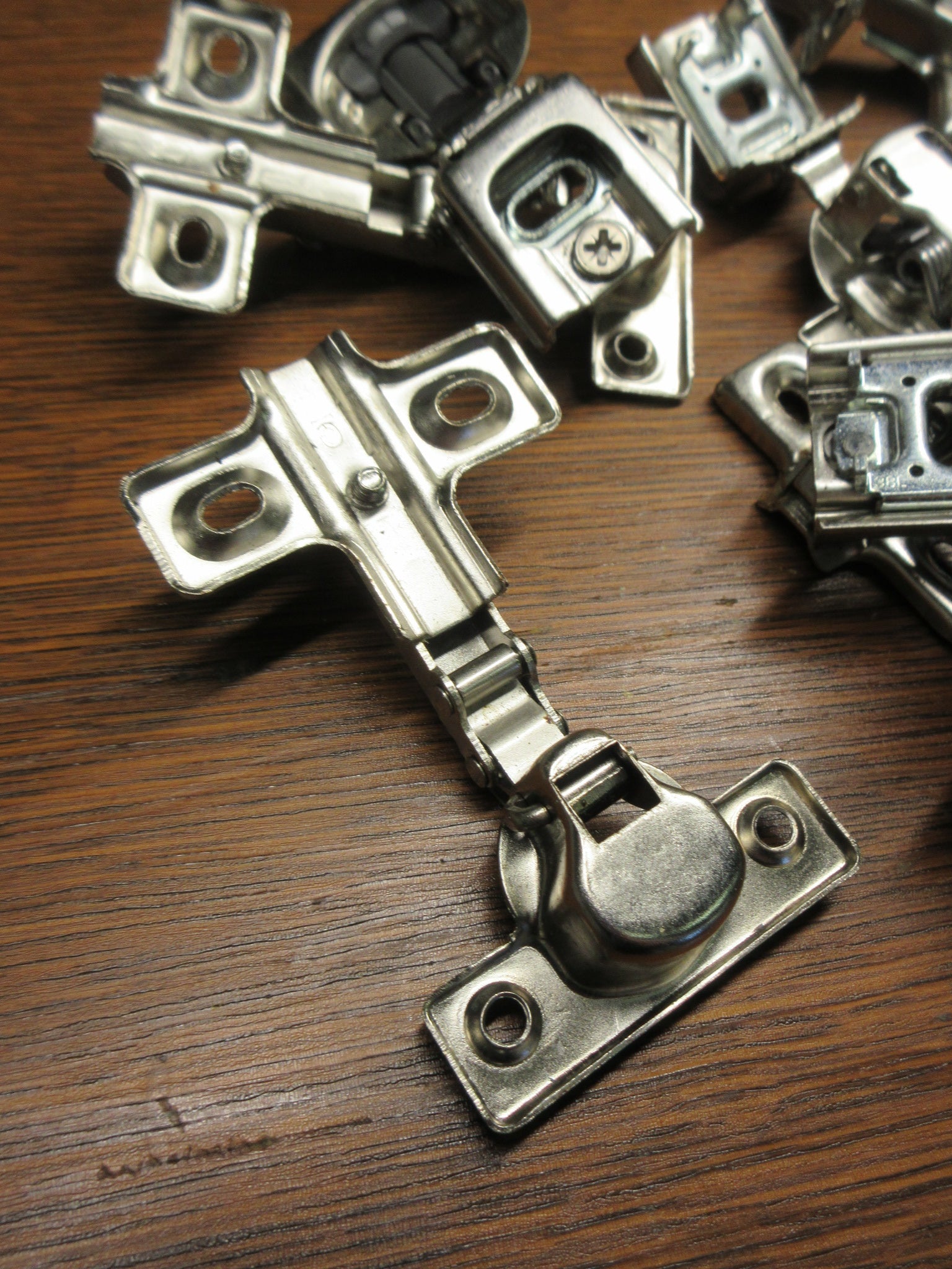 Lot of Ten Cabinet Hinges