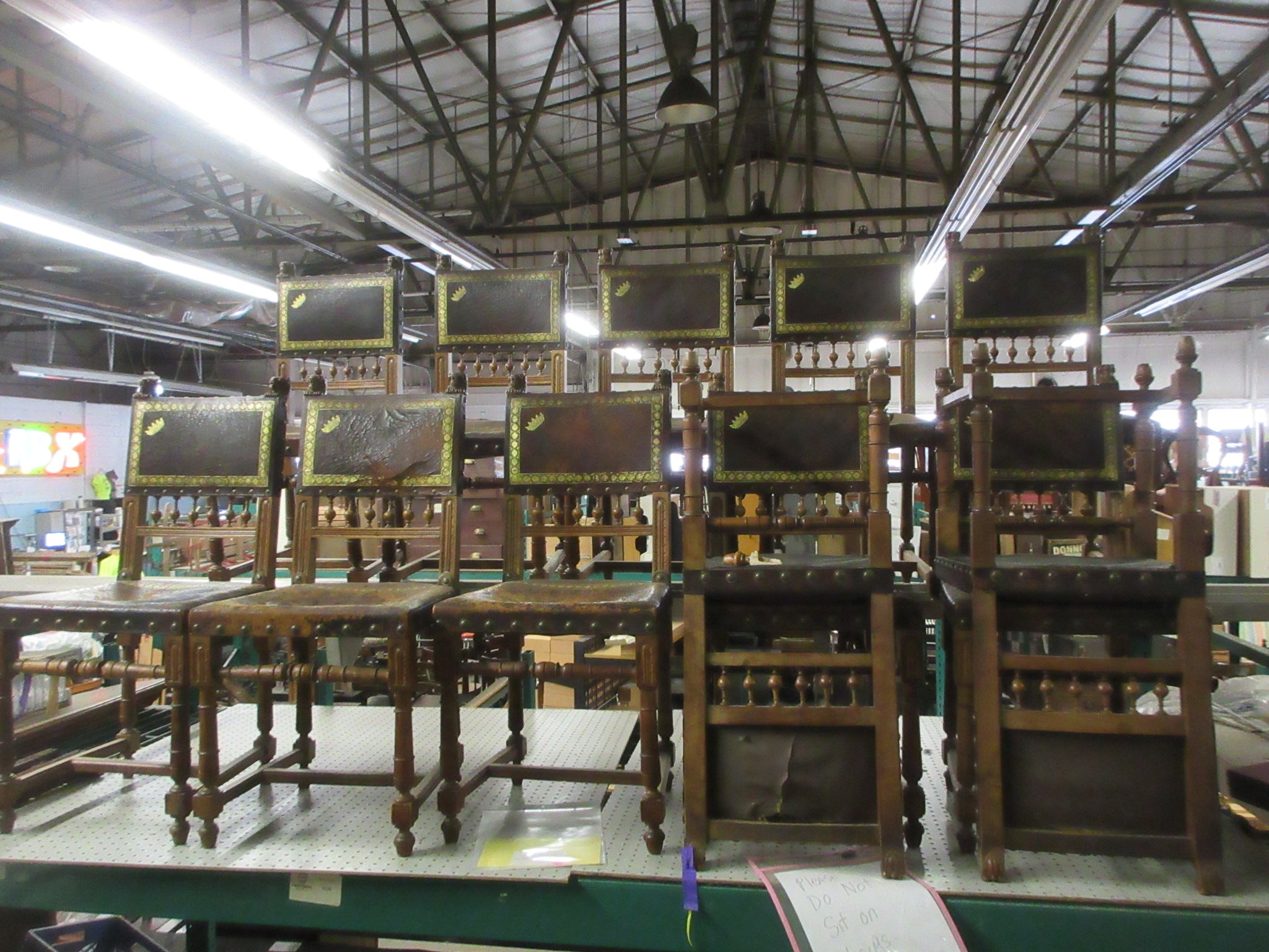 Set of 12 Antique Italian Leather Tooled Lion Head Chairs