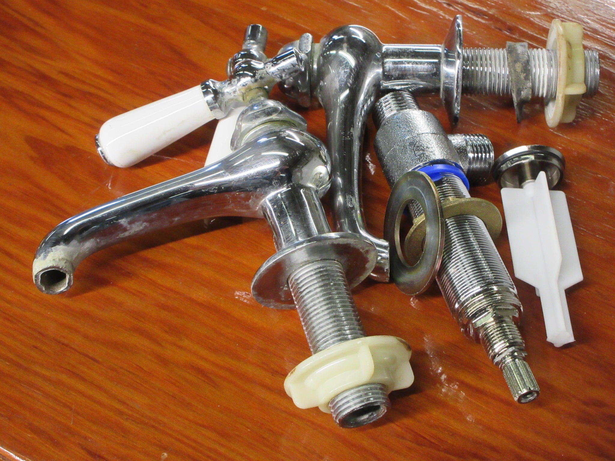 Chrome and Porcelain Sink Mixers with Drain