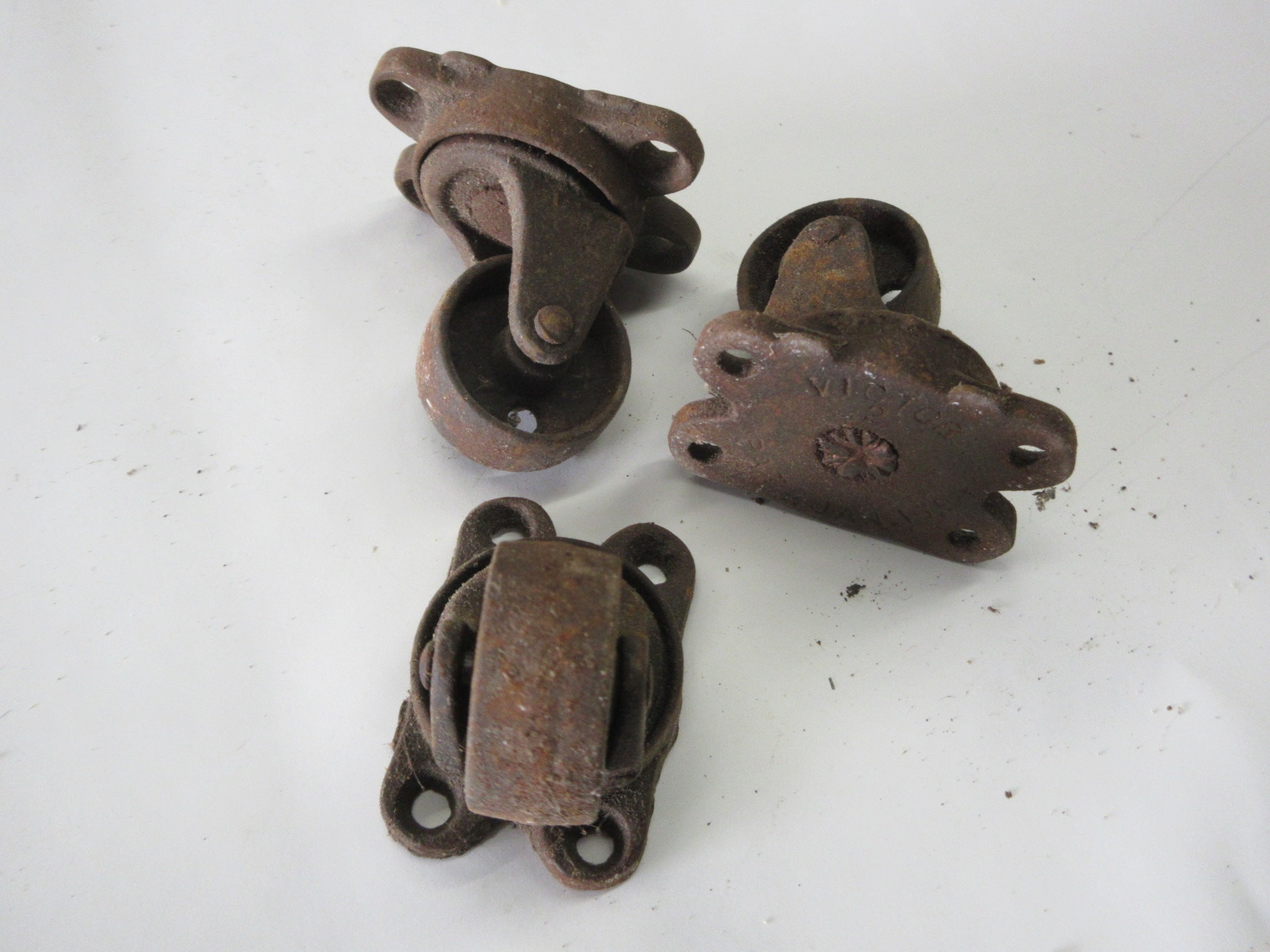 Antique Metal Swivel Casters (Set of Three)
