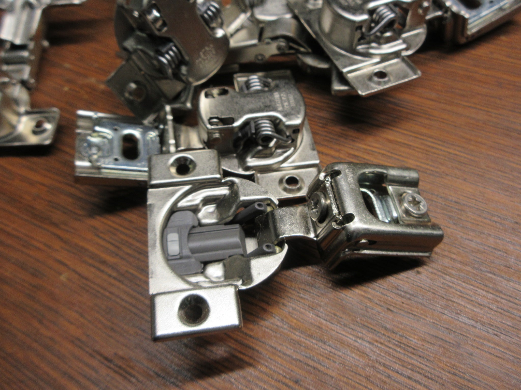 Lot of Ten Cabinet Hinges